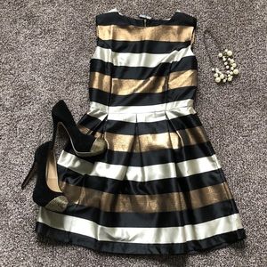 Champagne, bronze, and black cocktail dress